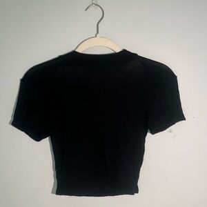 Its a Black top from Antistar